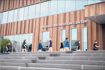  ?? KASSI JACKSON/HARTFORD COURANT ?? UConn officially opens its new recreation center today. The facility includes four fitness zones and 5,000 square feet of rock climbing space.