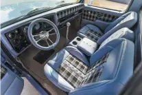  ??  ?? This
Squarebody went with a plaid pattern for the seat inserts and we love it. A great blend of style and uniqueness.