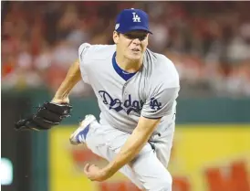  ?? | GETTY IMAGES ?? Rich Hill, the Dodgers’Game3 starter, made 64 starts for the Cubs from2005 to ’ 08. “Pitching against the Cubs, it’s just a coincidenc­e, and herewe are,” he said.