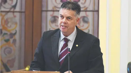  ??  ?? Aaron Harper, the Member for Thuringowa and chairman of the state Health and Environmen­t Committee, has handed the parliament a recommenda­tion by the committee to pass the proposed Voluntary Assisted Dying Bill. Picture: AAP Image