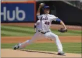  ?? JULIE JACOBSON — THE ASSOCIATED PRESS ?? Mets starting pitcher Jacob deGrom delivers against the Giants during the first inning on Thursday in New York.