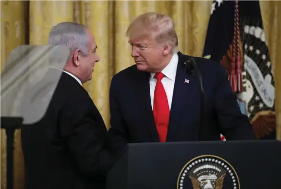  ?? FOTO: ALEX BRANDON/TT-AP ?? USA:s president Donald Trump och Israels premiärmin­ister Benjamin Netanyahu är några av de som skrivit på avtalet. Arkivbild.