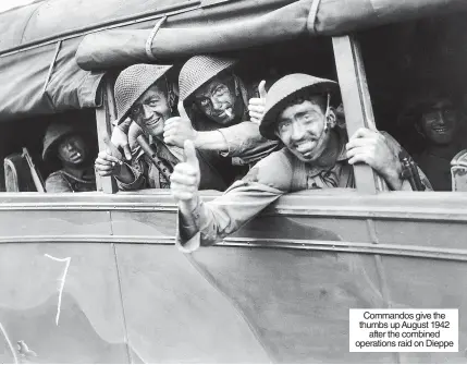  ?? ?? Commandos give the thumbs up August 1942 after the combined operations raid on Dieppe