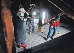  ?? CLIFFORD SKARSTEDT EXAMINER ?? Sue Bell-Gastle, left, and Kate Ramsay of the Building Opportunit­y Campaign Cabinet tour the third and fourth floors of the north wing of The Mount Community Centre with director of strategic advancemen­t Andi van Koeverden on Friday.