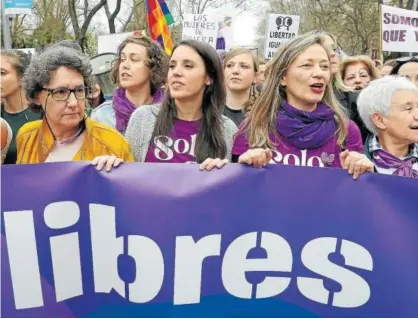  ?? Fotos: Efe ?? La ministra Irene Montero, en el centro, en la manifestac­ión por el Día de la Mujer en Madrid.