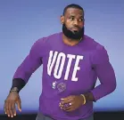  ?? KEVIN C. COX/ GETTY IMAGES ?? LeBron James has tried on and off the court to get out the vote this year.