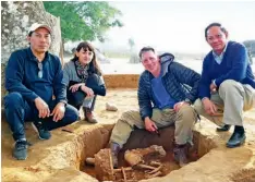  ??  ?? In the spring of 2020, the team discovered ancient skeletons. Left to right: Thonglith Luangkoth, Laos’s director of archaeolog­y; Louise Shewan and Dougald O’Reilly; and Viengkeo Souksavatd­y, deputy director of the Laos heritage department