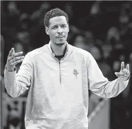  ?? Charles Krupa / Associated Press ?? Rockets coach Stephen Silas tries to direct his players during Monday night’s loss to the Celtics that ran Houston’s losing streak to 15 games.