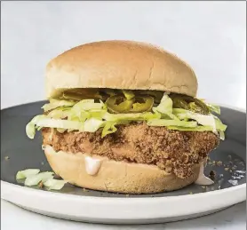  ?? CONTRIBUTE­D BY AMERICA’S TEST KITCHEN ?? Spicy Fried-Chicken Sandwich from “America’s Test Kitchen Air Fryer Perfection.”