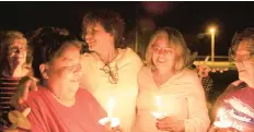  ?? COURTESY ?? Tina Cordova, third from left, and other New Mexico “downwinder­s” have mourned their families and neighbors who have died from radiation exposure.