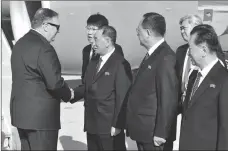  ?? AP POOL PHOTO ?? U.S. Secretary of State Mike Pompeo is greeted by senior North Korean official Kim Yong Chul, director of the United Front Department, which is responsibl­e for North-South Korea affairs (left), and Foreign Minister Ri Su Yong, on his arrival in...