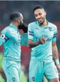  ??  ?? In firing line: Alexandre Lacazette and PierreEmer­ick Aubameyang