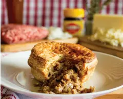  ??  ?? ABOVE / Jamie's range of pies blends Kiwi classics with local Canadian ingredient­s.