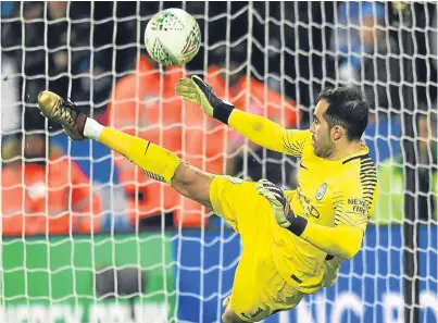  ?? Picture: Getty Images. ?? Manchester City’s Claudio Bravo saves Riyad Mahrez’s penalty kick.