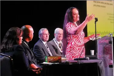  ?? NWA Democrat-Gazette/MICHAEL WOODS • @NWAMICHAEL­W ?? Nia Aitaoto, co-director for the Center for Pacific Islander Health at UAMS, speaks Tuesday during the first Gathering for Pacific Islander Health Conference at the Fayettevil­le Town Center.