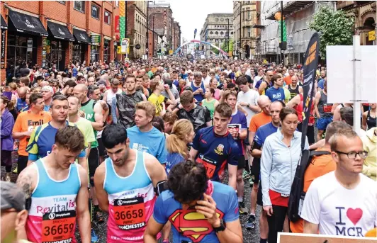  ??  ?? Unbowed: A sea of joggers in Manchester yesterday just days after the bomb attack