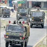  ?? WASEEM ANDRABI/HT PHOTO ?? An army convoy moves along a highway leading to Ladakh on ■
Wednesday.