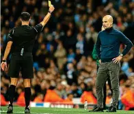  ?? AP ?? Heated: Guardiola is shown a yellow card