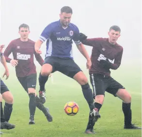  ?? PICTURES: Mark Stillman Football Photograph­y ?? AFC BAS (blue) were 9-1 winners over Radstock Albion in the latest round of Bath &amp; District League fixtures