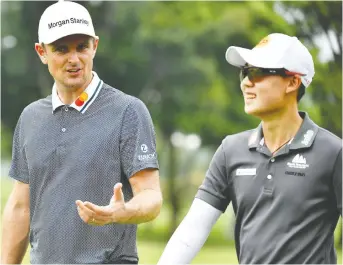  ?? PAUL LAKATOS/LAGARDERE SPORTS/AFP VIA GETTY IMAGES ?? Justin Rose of England, left, says defending his Farmers Insurance Open title at Torrey Pines “really gets my PGA Tour season up and running.”