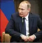  ?? ALEXANDER ZEMLIANICH­ENKO / AP ?? Russian President Vladimir Putin and President Donald Trump talked Tuesday about bolstering efforts to resolve the war in Syria.