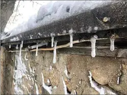  ?? JON HAMMOND / FOR TEHACHAPI NEWS ?? Wind icicles like these that formed on the old woodshop are blunt rather than pointed.