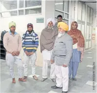  ??  ?? LEFT Prakash Singh and relatives of other patients gather outside the prayer room at the Government Medical College and Hospital in Chandigarh.