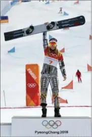  ?? LEE JIN-MAN — THE ASSOCIATED PRESS ?? Gold medal winner Ester Ledecka, of the Czech Republic, celebrates after the women’s parallel giant slalom at Phoenix Snow Park at the 2018 Winter Olympics in Pyeongchan­g, South Korea, Saturday.