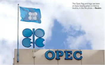  ?? — Reuters ?? The Opec flag and logo are seen at Opec headquarte­rs in Vienna, Austria, in this file photo.