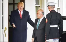  ?? T.J. KIRKPATRIC­K / THE NEW YORK TIMES ?? President Donald Trump greets Iraqi Prime Minister Haider al-Abadi upon his arrival at the White House on Monday.