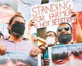  ?? AIJAZ RAHI/AP ?? PEOPLE DEMANDING THE RELEASE of Disha Ravi during a protest rally in Bengaluru on February 15.
