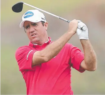  ?? Picture: MARK METCALFE/GETTY ?? FOCUS: Scott Hend of Australia hits an approach shot during yesterday’s pro-am ahead of the 2017 Fiji Internatio­nal at Natadola Bay Championsh­ip Golf Course.