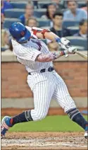  ?? Ap-frank Franklin II ?? New York Mets’ Pete Alonso hits a home run during the fourth inning of the team’s baseball game against the Philadelph­ia Phillies in New York on Friday.