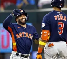  ?? Ron Jenkins/Getty Images ?? Jose Altuve hit five of Houston’s 16 home runs in the Houston Astros’ sweep of Texas.