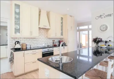  ?? PICTURE: GREEFF CHRISTIE’S INTERNATIO­NAL REAL ESTATE ?? An open-plan kitchen like this one in a home in Noordhoek is high on the wish lists of most buyers and is even more desirable since the scullery is hidden around the corner.