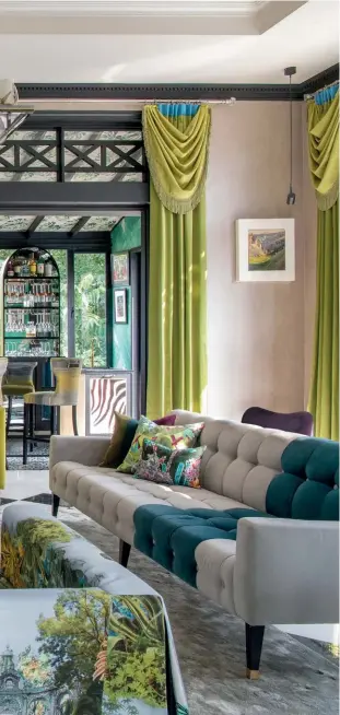  ??  ?? LEFT TO RIGHT The painting echoes the colour palette of the furnishing­s in the living room; Nikki Hunt, principal of Design Interventi­on, went all out with the maximalist look for the recent renovation of her home