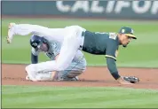  ?? RAY CHAVEZ — STAFF PHOTOGRAPH­ER ?? Franklin Barreto of the A’s gets Tampa Bay’s C.J. Cron at second before throwing to first to try for a double play.