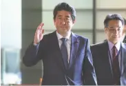  ?? Kazuhiro Nogi / AFP / Getty Images ?? Prime Minister Shinzo Abe faces questions over whether his friends won preferenti­al treatment.