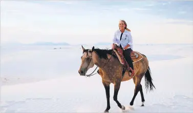  ?? COURTESY PHOTO ?? Gov. Michelle Lujan Grisham recently took a horseback ride at White Sands National Monument as part of a five-day tour highlighti­ng the state’s tourism industry and outdoor recreation opportunit­ies.