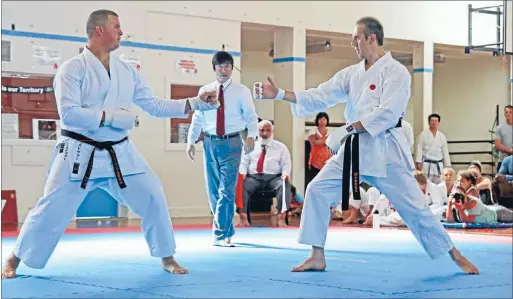  ?? Photo: SUPPLIED ?? KARATE MASTER: Danie van der Linde, right, fights Chris Pappas while Naka Shihan (meaning master) referees at the 2014 JKA National karate competitio­n which qualified him for the Karate World Cup in Japan, where he represente­d New Zealand for the first...