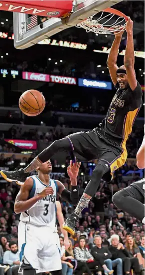  ?? — Reuters ?? High performanc­e: Los Angeles Lakers’ Corey Brewer dunking against the Minnesota Timberwolv­es on Saturday.