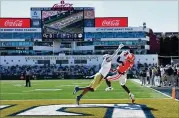  ?? HYOSUB SHIN/AJC 2020 ?? Clemson’s Cornell Powell makes a touchdown catch as Tech cornerback Tre Swilling attempts to defend in an Oct. 17 game in Atlanta. Swilling said he expects the secondary to look like it’s led by veteran starters, and the group aims to improve this season.