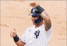  ?? Kathy Willens / Associated Press ?? Yankees shortstop Gleyber Torres gestures toward the dugout after hitting a tiebreakin­g, pinch-hit two-run double against the Orioles in 2020.