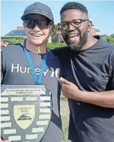  ?? Picture: SUPPLIED ?? RIPPER: Pastor Cjay Jansen congratula­tes Daniel Emslie for winning the U18 South African champion surfing title in J-Bay last week.