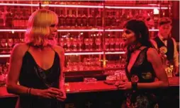  ?? UNIVERSAL ?? Charlize Theron and Sofia Boutella star in the action-thriller Atomic Blonde.