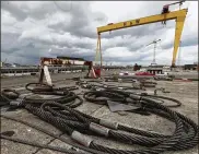  ?? AP ?? Harland and Wolff shipyard workers vowed to occupy the shipyard until heavy industry and shipbuildi­ng could be secured, but the government so far has not intervened.