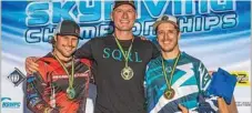  ?? Photo: Steve Fitchett ?? Chris Byrnes winning gold at the 2019 Australian Skydiving Nationals, setting three national records in the process. He is on the podium with Luke Rogers (left) and Jason Dodunski (right).