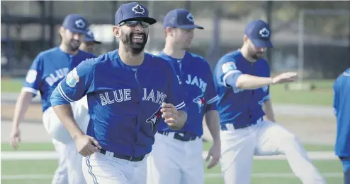  ?? FRANK GUNN / THE CANADIAN PRESS ?? Toronto Blue Jays outfielder Jose Bautista warms up at spring training in Dunedin, Fla., on Tuesday.