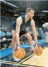  ?? STUART CAHILL/BOSTON HERALD ?? Uconn forward Alex Karaban goes through dribbling drills during a practice Wednesday in Boston.