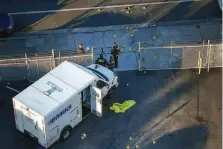  ?? ?? Police left at least 21 markers indicating shell casings at the scene of the attempted robbery on Internatio­nal Boulevard.